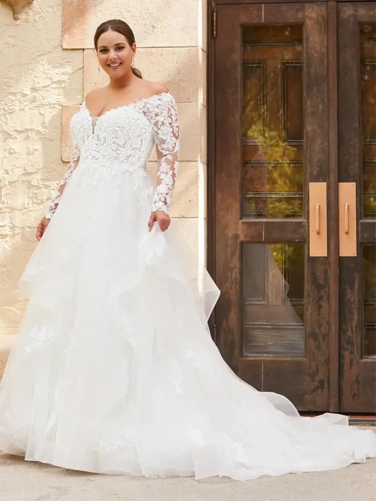Model wearing a plus size dress