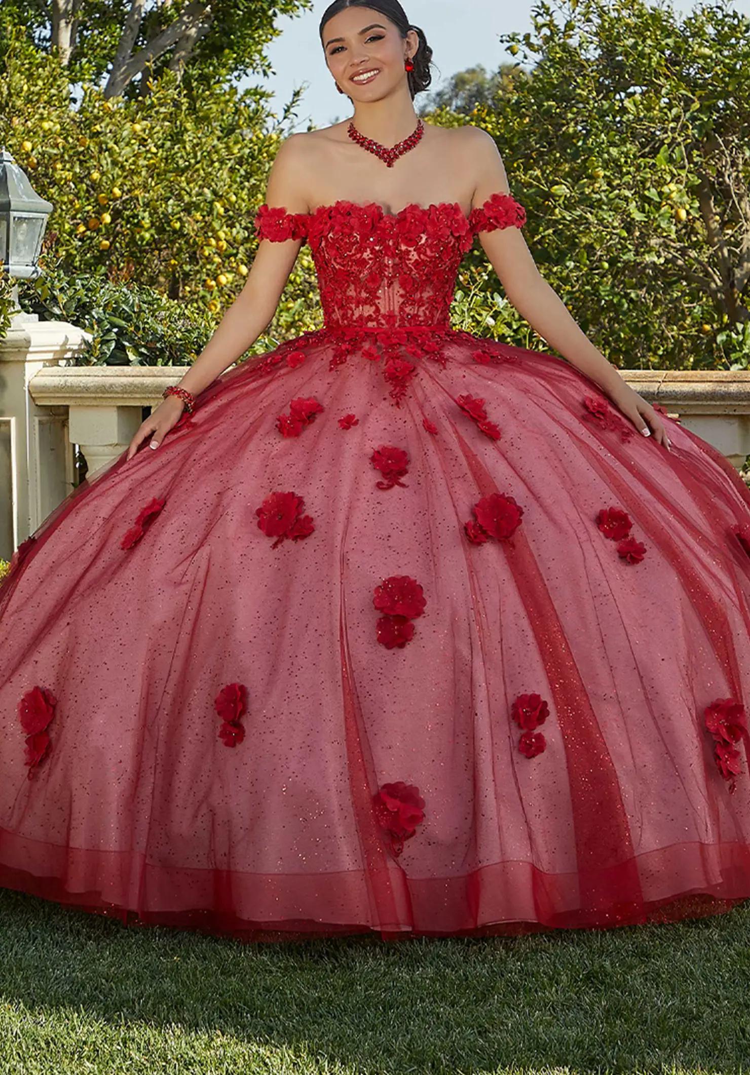 Model wearing a quinceañera dress. Mobile image
