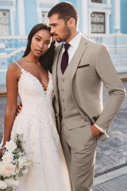 Couple wearing a white gown and a black suit